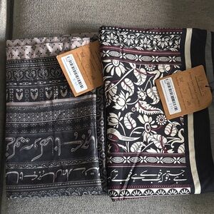 Elegant Black and Cream Patterned Scarves